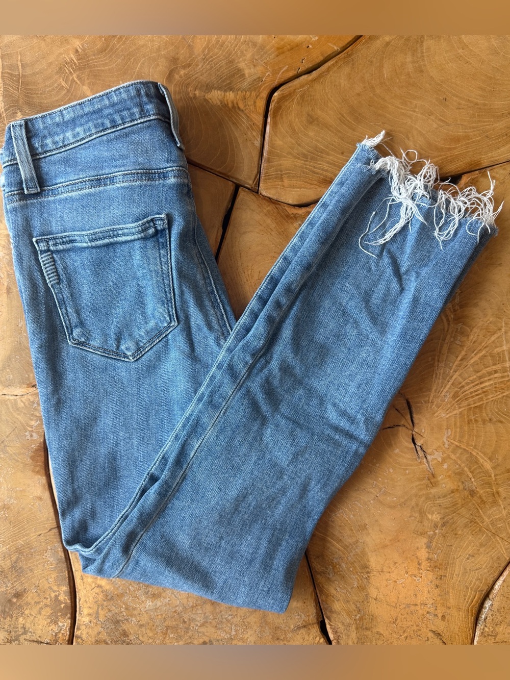 Paige Jeans. Cindy style. Size 25. Raw hem and distressed on waist.